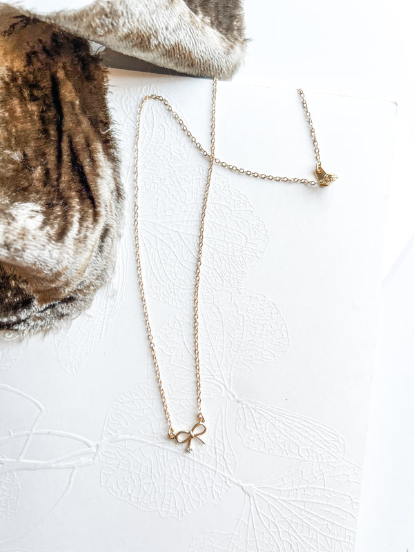 Luxe Gold Crystal Bow Necklace