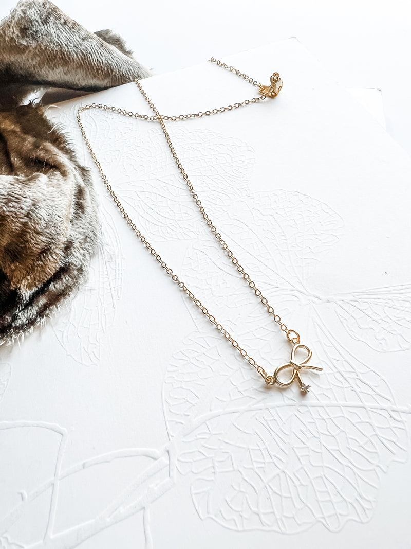 Luxe Gold Crystal Bow Necklace